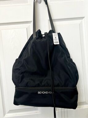 Beyond Yoga Black Drawstring Backpack with Lower Zip Compartment